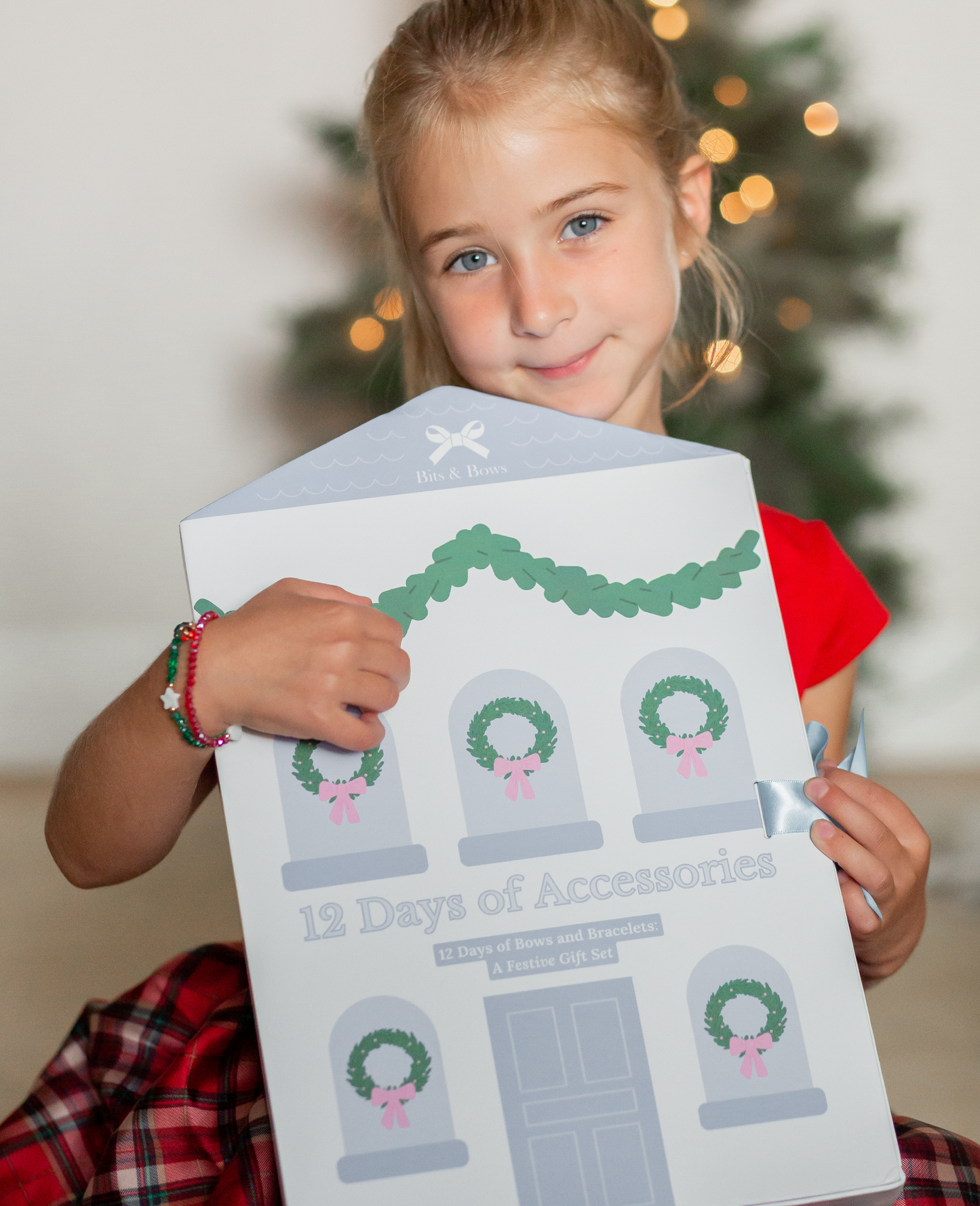 Girl holding advent accessories gift set