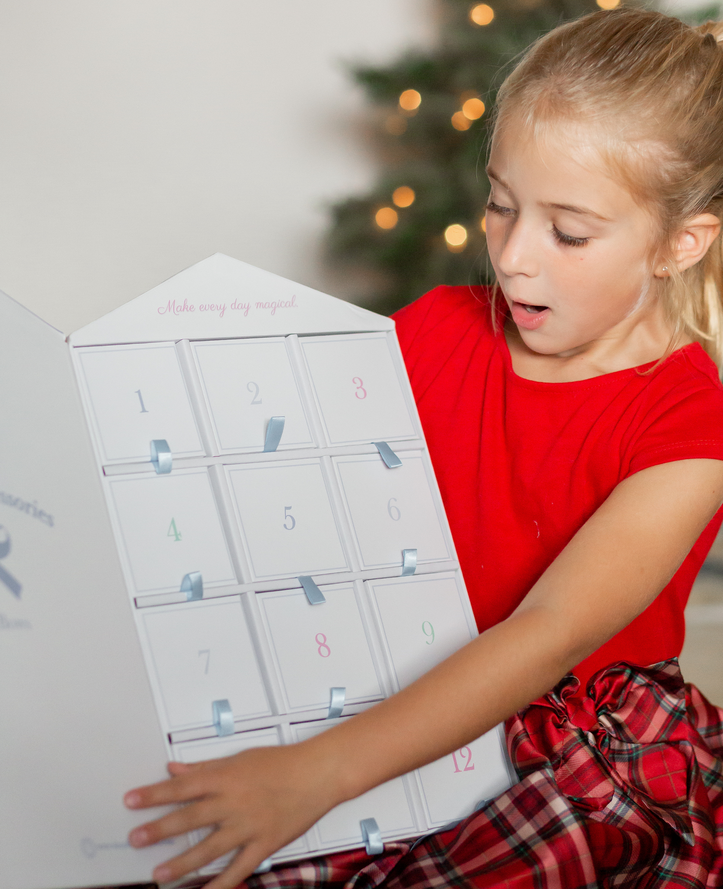 Girl holding advent accessories gift set