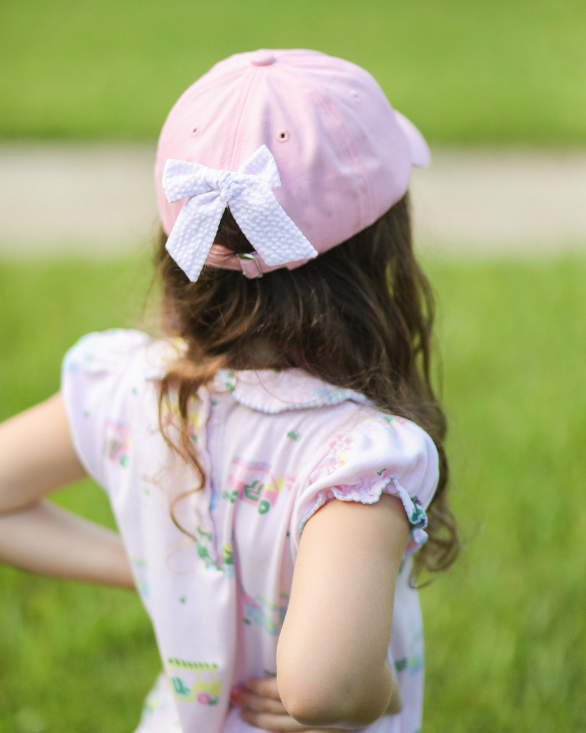 Customizable Rainbow Golf Cart Bow Baseball Hat (Girls)