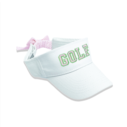 White visor with golf word embroidery and a bow on the back